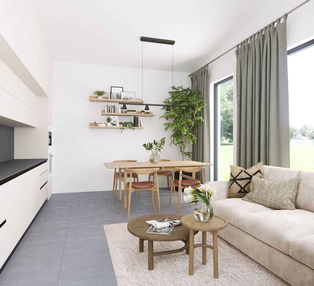 Living room with sofa, coffee table and open kitchen