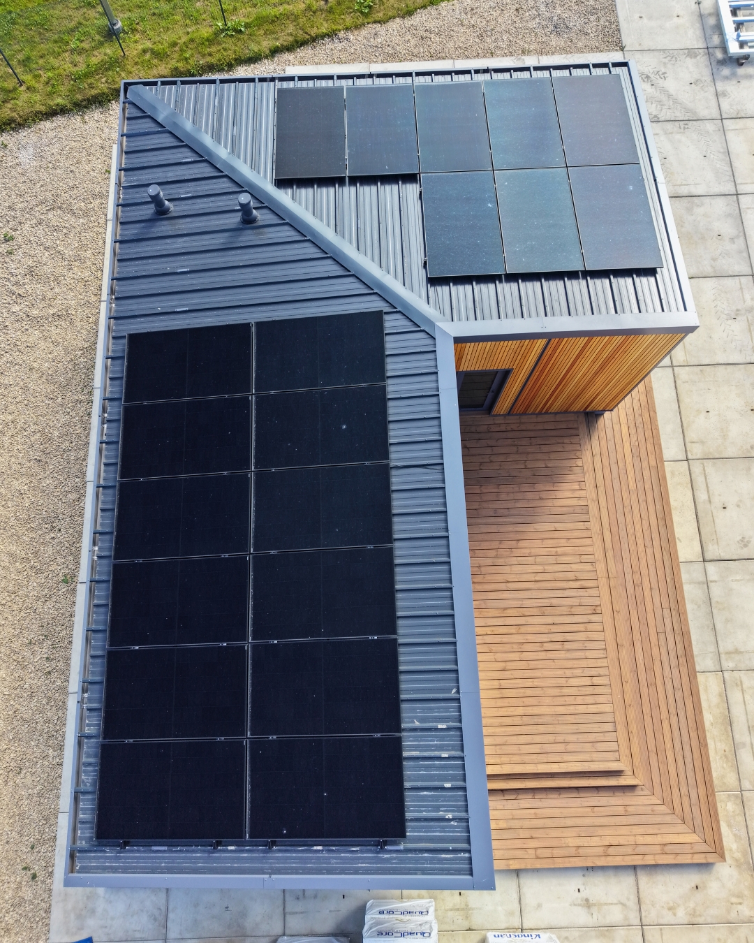10 kW solar panel array on the roof of a TheHouz modular home, top-down view