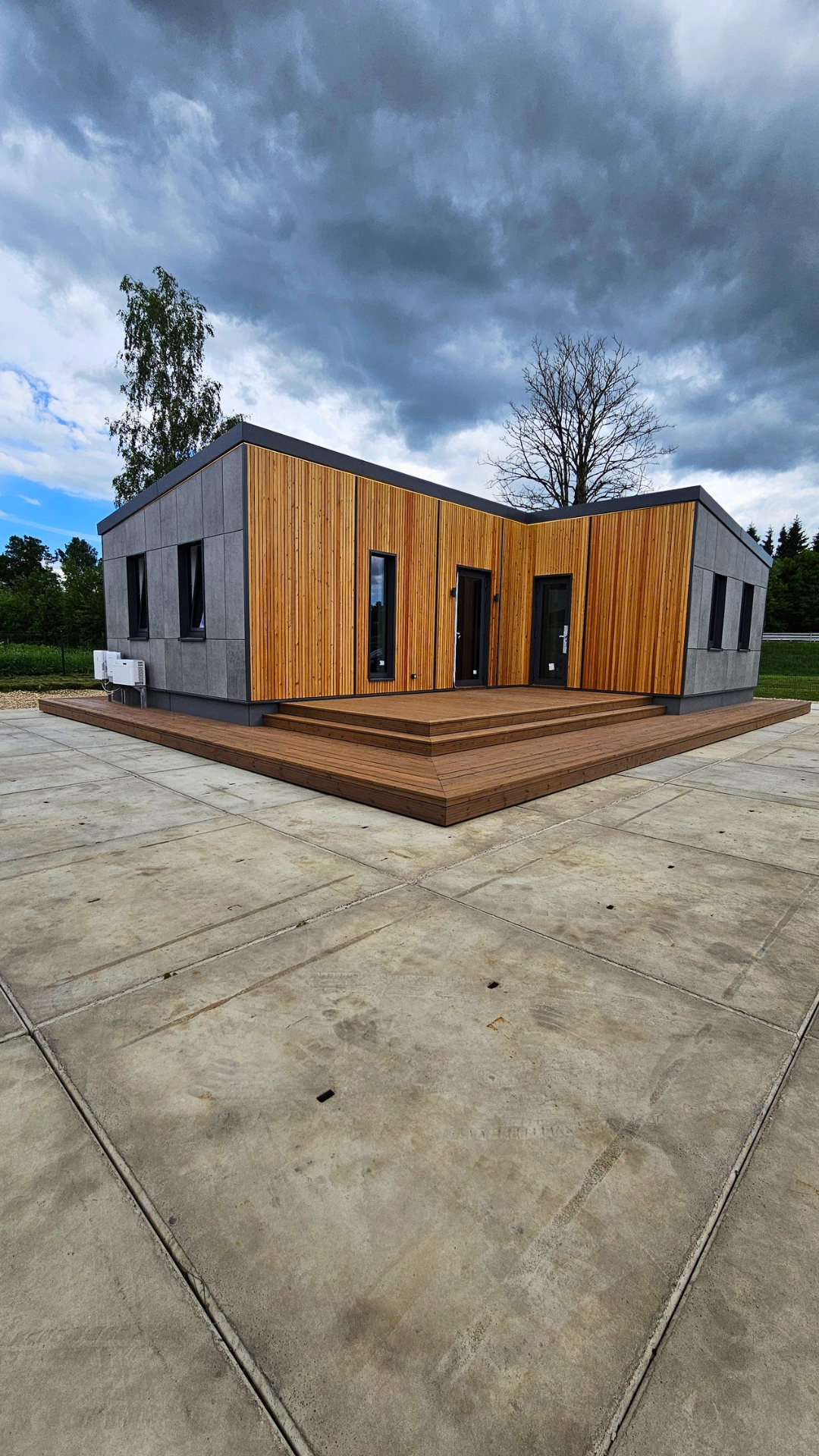 TheHouz L-Shape S modular home exterior with Dekton and timber cladding and terrace