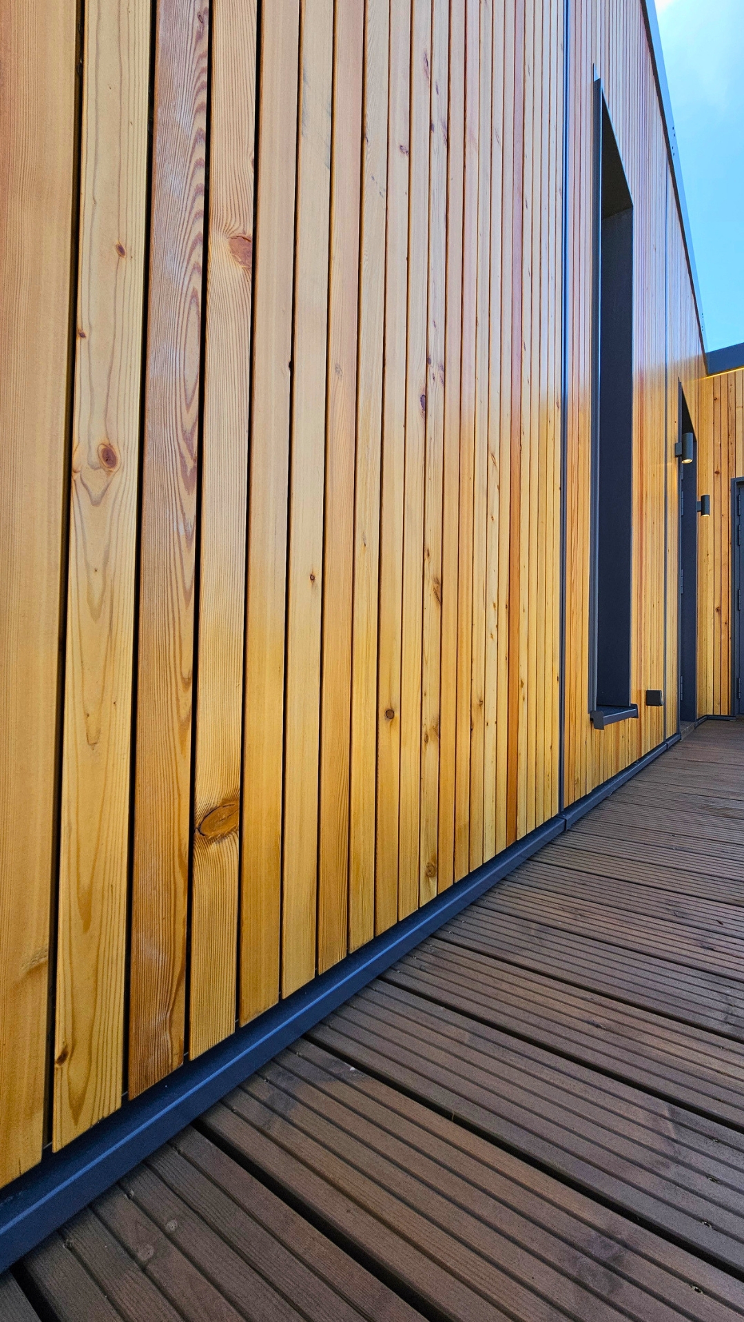 Close-up of vertical timber cladding on a TheHouz modular home